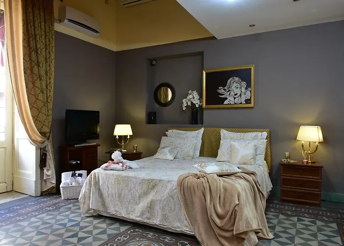 De Curtis 3 Stelle カターニア